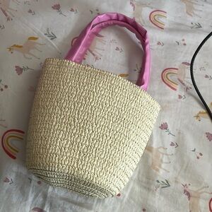 Small cream colored children’s beach bag
